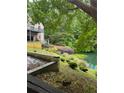 Backyard with lake access at 1640 Settindown Dr, Roswell, GA 30075