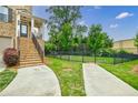 View of the community dog park with fencing and green space for outdoor recreation at 2464 Georgetown Ave, Atlanta, GA 30345