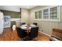 Cozy dining area with wood floors, natural light, and traditional decor at 2559 Defoors Ferry Nw Rd, Atlanta, GA 30318