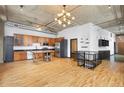 A modern kitchen featuring stainless appliances, wood cabinets and countertops, and industrial-style accents at 660 Glen Iris Dr # 206 & 109, Atlanta, GA 30308