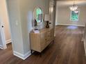 Inviting entryway with wood flooring and stylish decor, leading into a bright living space at 50 Stonington Pl, Marietta, GA 30068
