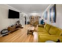 Inviting living room featuring hardwood floors, a modern couch, and an open layout at 1177 Church St # A, Decatur, GA 30030