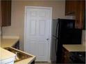 Functional kitchen with stainless steel sink, ample counter space and black appliances for easy meal preparation at 3500 Sweetwater Rd # 522, Duluth, GA 30096
