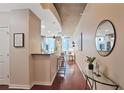 Inviting hallway featuring modern lighting, hardwood floors, and stylish decor at 855 Peachtree Ne St # 1311, Atlanta, GA 30308