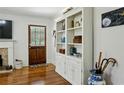 Inviting living area featuring hardwood floors and a decorative fireplace at 129 2Nd Se Ave, Atlanta, GA 30317