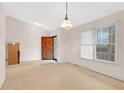 Bright living room with a window that allows in natural light at 991 Lisa Kay Dr, Lawrenceville, GA 30046