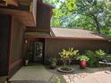 Exterior shot of a home's front entrance with simple landscaping at 406 Vivian Way, Woodstock, GA 30188