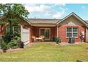 Cozy backyard with a small patio area, perfect for outdoor relaxation and entertaining at 132 Tara Commons Dr, Loganville, GA 30052