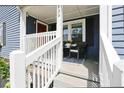 Inviting front porch features a seating area, providing a cozy spot to relax outdoors at 139 Merritt Se St, Marietta, GA 30060