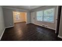 Inviting living room featuring hardwood floors and bright windows at 767 Vinson Pl, Atlanta, GA 30315