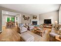 Spacious living room featuring a fireplace, neutral decor, and hardwood flooring at 2300 Newport Lndg, Atlanta, GA 30009