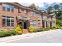 Beautiful brick townhome with mature trees and manicured landscaping at 1222 Lavista Ne Cir, Atlanta, GA 30324