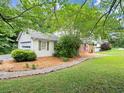 View of house and well kept lawn at 2458 Zachary Woods Dr, Marietta, GA 30064