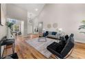 Bright living room with hardwood floors, contemporary furniture, and decor; a comfortable and stylish space to relax at 939 Whistler Ln, Canton, GA 30114