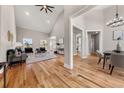 Spacious open-concept living room with vaulted ceiling, abundant natural light, and hardwood floors, perfect for entertaining at 939 Whistler Ln, Canton, GA 30114