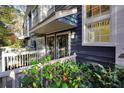 Charming two-story exterior with navy siding, white trim, and a well-maintained front entrance at 1482 N Crossing Ne Cir, Atlanta, GA 30329