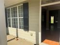 Welcoming front porch featuring black shutters and natural light at 21 Spring Folly Nw, Cartersville, GA 30121