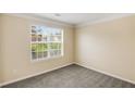 Bright bedroom with a large window offering ample natural light at 40 Wimberly Way, Covington, GA 30016