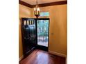 Inviting entryway featuring hardwood floors and an open door leading to the outside at 260 Manning Sw Rd # 42, Marietta, GA 30064