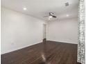 Bright living room featuring hardwood floors, ceiling fan, and natural light at 1926 Lakewood Se Ter, Atlanta, GA 30315