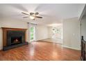 Cozy living room with hardwood floors and fireplace at 115 Jamie Dr, Hiram, GA 30141