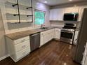 Modern kitchen featuring stainless steel appliances and sleek countertops at 1909 Cindy Dr, Decatur, GA 30032