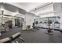 A well-equipped gym featuring treadmills, weights, and machines for a complete workout at 3445 Stratford Rd # 1501, Atlanta, GA 30326