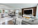 Spacious living room with modern decor, TV, and comfortable seating area at 1934 Glen Echo Dr, Decatur, GA 30032