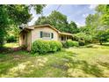 Inviting one-story brick home with a cozy front porch, manicured landscaping and charming curb appeal at 2368 Ellis Court, Snellville, GA 30078