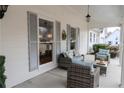 Cozy front porch with comfortable seating and stylish decor at 762 Thompson Ln, Loganville, GA 30052