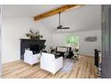 Bright and spacious living room with hardwood floors and stone fireplace at 2442 Falcon Ct, Lawrenceville, GA 30043