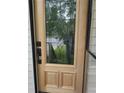 A beautiful wooden front door with decorative glass at 2811 Country Farms Ct, Snellville, GA 30039