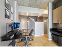 Inviting home office with modern desk setup and natural light, with hardwood floors and modern decor at 361 17Th Nw St # 2315, Atlanta, GA 30363