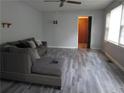 Comfortable living room featuring a ceiling fan and plenty of natural light at 244 Hilltop Sw Dr, Atlanta, GA 30315