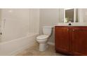 Standard bathroom with a vanity and a bathtub/shower combination at 2173 Pebble Beach Dr, Lawrenceville, GA 30043