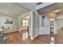 Open living space with hardwood floors, molding detail, and natural light at 4885 Maristone Landing Way, Cumming, GA 30040