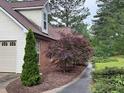 Well-maintained exterior with a combination of siding, brick and nice landscaping at 300 Gaelic Way, Tyrone, GA 30290