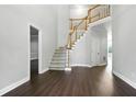 Elegant foyer with hardwood floors and staircase at 946 Cornwall Sw Ct, Marietta, GA 30064