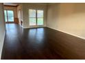 Inviting living room featuring hardwood floors and plenty of natural light at 3222 Wyndham Park Ct, Decatur, GA 30034