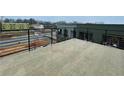 Spacious rooftop patio with metal railing and city views at 919 Hughley Circle # 72, Atlanta, GA 30316