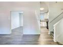 Bright living area featuring modern flooring, fresh paint, and open layout at 3959 Wood Path Dr, Stone Mountain, GA 30083