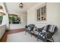 Relaxing front porch featuring comfortable seating and a welcoming ambiance for enjoying outdoor moments at 614 Cooledge Ne Ave, Atlanta, GA 30306