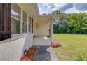 A cozy front porch with flower pots that add to the home's curb appeal at 3600 Anglin Rd, Loganville, GA 30052