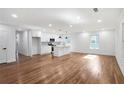 Open-concept area boasting hardwood floors, white walls, and recessed lighting throughout at 1321 Avon Sw Ave, Atlanta, GA 30310