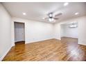 Bright living room with new laminate wood flooring, recessed lighting, and fresh, neutral paint at 1693 Montreal Rd, Tucker, GA 30084