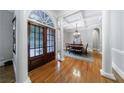 Elegant dining room boasts hardwood floors, coffered ceilings, and natural light at 1255 Beech Haven Ne Rd, Atlanta, GA 30324