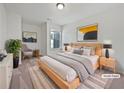 Comfortable bedroom featuring a cozy bed with nightstands, carpet flooring, and lots of natural light at 44 Trailview Ln # 78, Hiram, GA 30141