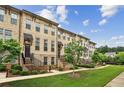 Beautiful brick townhouses with well-maintained lawns and professional landscaping at 631 Avondale Creek Dr, Decatur, GA 30032