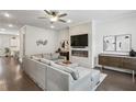 Inviting living room showcasing a fireplace, hardwood floors, and modern decor at 631 Avondale Creek Dr, Decatur, GA 30032