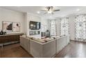 Bright living room featuring hardwood floors, modern fireplace and stylish furnishings at 631 Avondale Creek Dr, Decatur, GA 30032